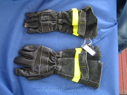 Geschrumpfter und neuer schwarzer Lederhandschuh nach EN 659:1996
